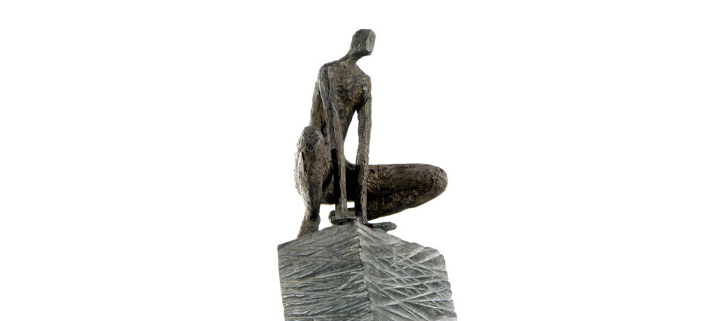 Crouching man on high square pedestal by French sculptor Val - Valérie Goutard - with Sculptureval