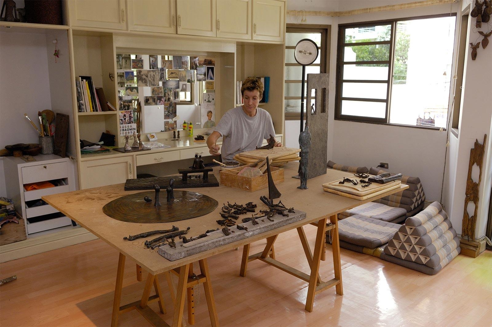 French sculptor Val - Valérie Goutard - in Bangkok studio doing bronze sculptures with Sculptureval